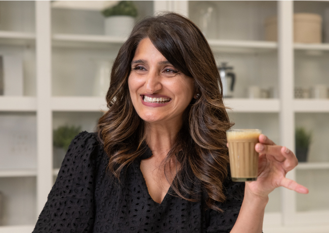 Monica Sunny holding some Chai