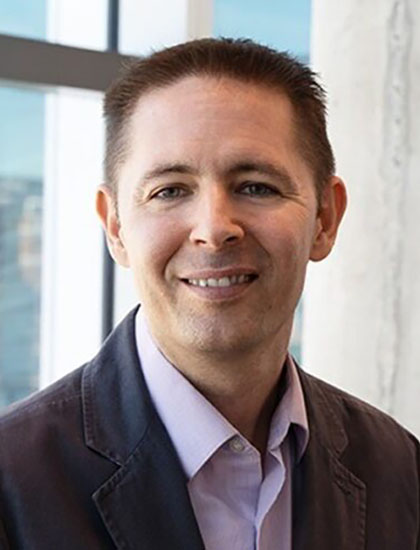 Headshot of Chris Rozell.