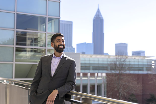 Alex Duncan portrait standing on the binary bridge at Georgia Tech.