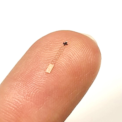 close-up of thumb with sensor on it