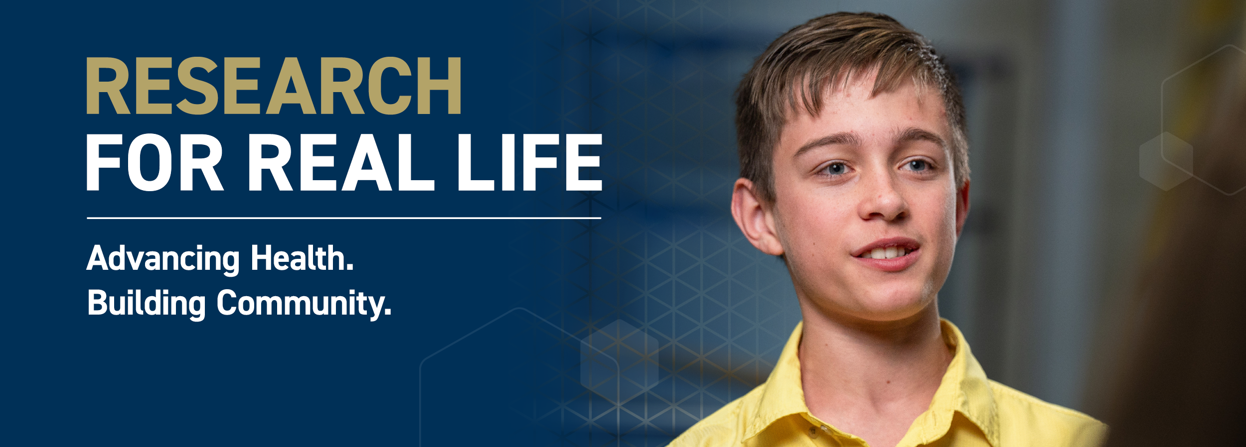 young boy wearing a yellow shirt with a text overlay about research for real life
