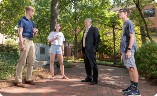 President Cabrera talking with Georgia Tech students on campus