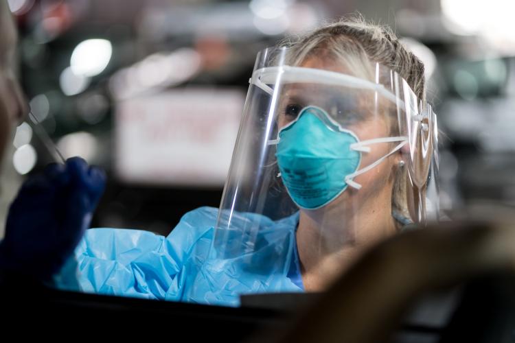 Nurse wearing face shield