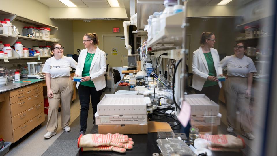 Marissa Moore and Blair Brettmann in the lab.