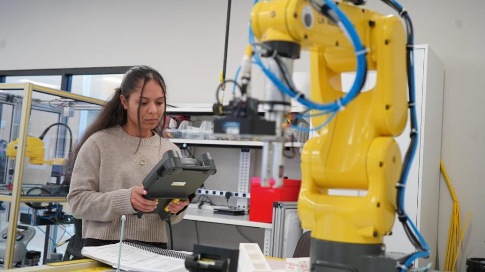 Naiya Salinas is one of a half-dozen students enrolled in the new AI Enhanced Robotic Manufacturing program at the Georgia Veterans Education Career Transition Resource (VECTR) Center, which is setting a new standard for technology-focused careers.