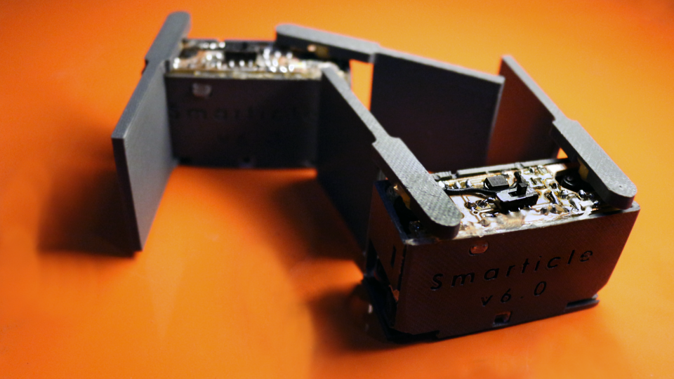 A pair of Smarticle robots from the lab of Prof. Dan Goldman. Earlier research from his group observed the arise of order in active matter from the physics of low rattling. (Photo Credit: Christa M. Ernst)