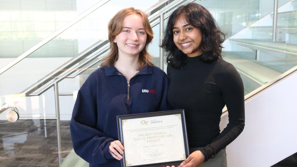 Electrosuit Founders Aubrey Hall and Sherya Chakraborty pose for their third place win in the Spring 2024 I2P Showcase