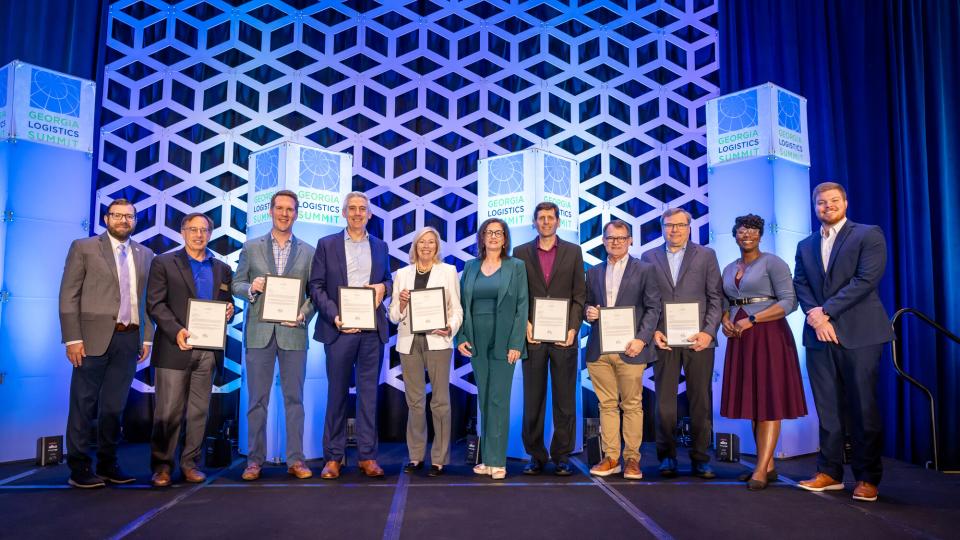 Members of the Georgia Center of Innovation – Logistics Advisory Board gathered at the 2025 Georgia Logistics Summit, where each received a personal note of recognition from Governor Brian Kemp for three years of dedicated service. Their collective efforts have advanced freight and logistics across Georgia—strengthening collaboration between industry, government, and academia to drive the state’s economic growth.