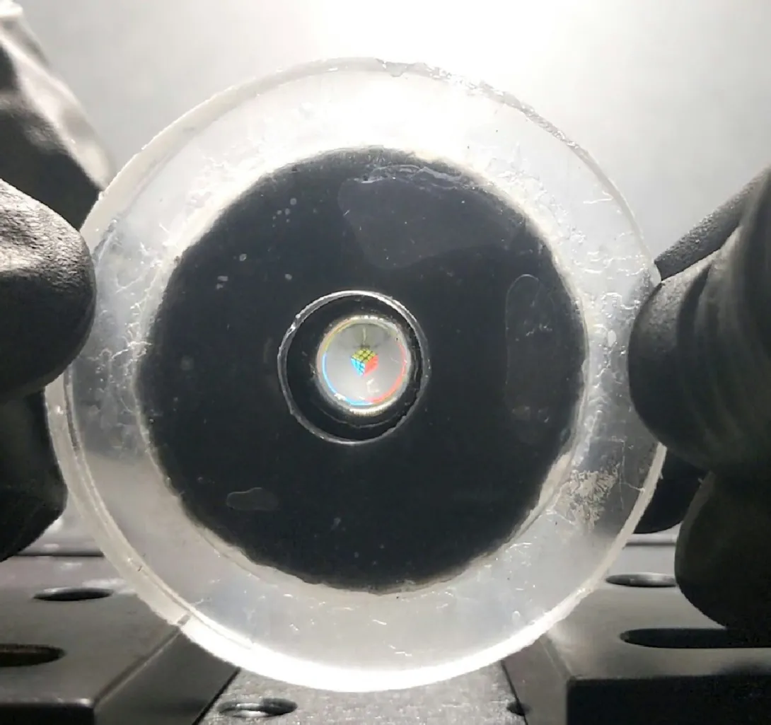This rubbery disc is an artificial eye that could give soft robots vision. Corey Zheng/Georgia Institute of Technology
