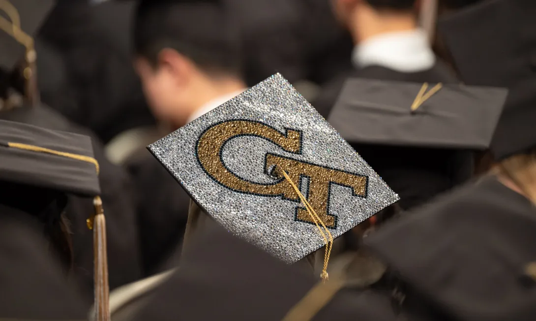 Georgia Tech logo on a graduation cap. 