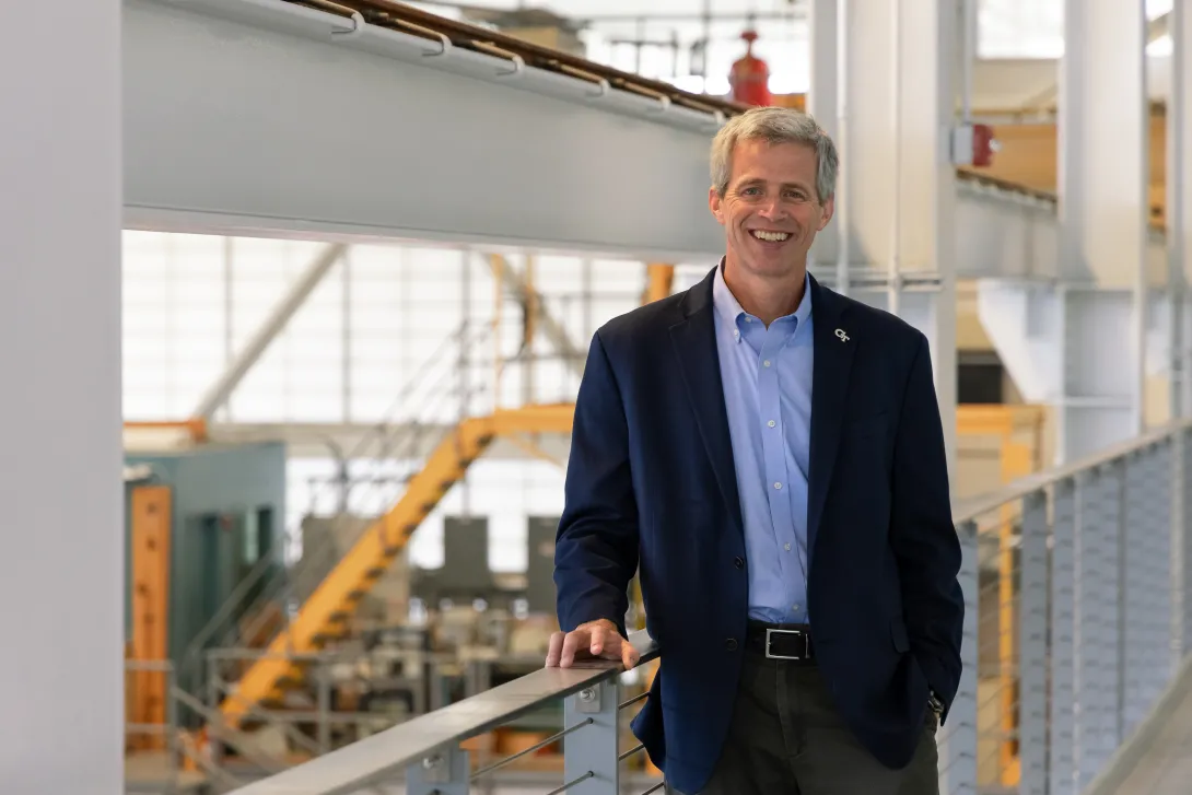 Tim Lieuwen standing above one of the Strategic Energy Institute's (SEI) research areas. 