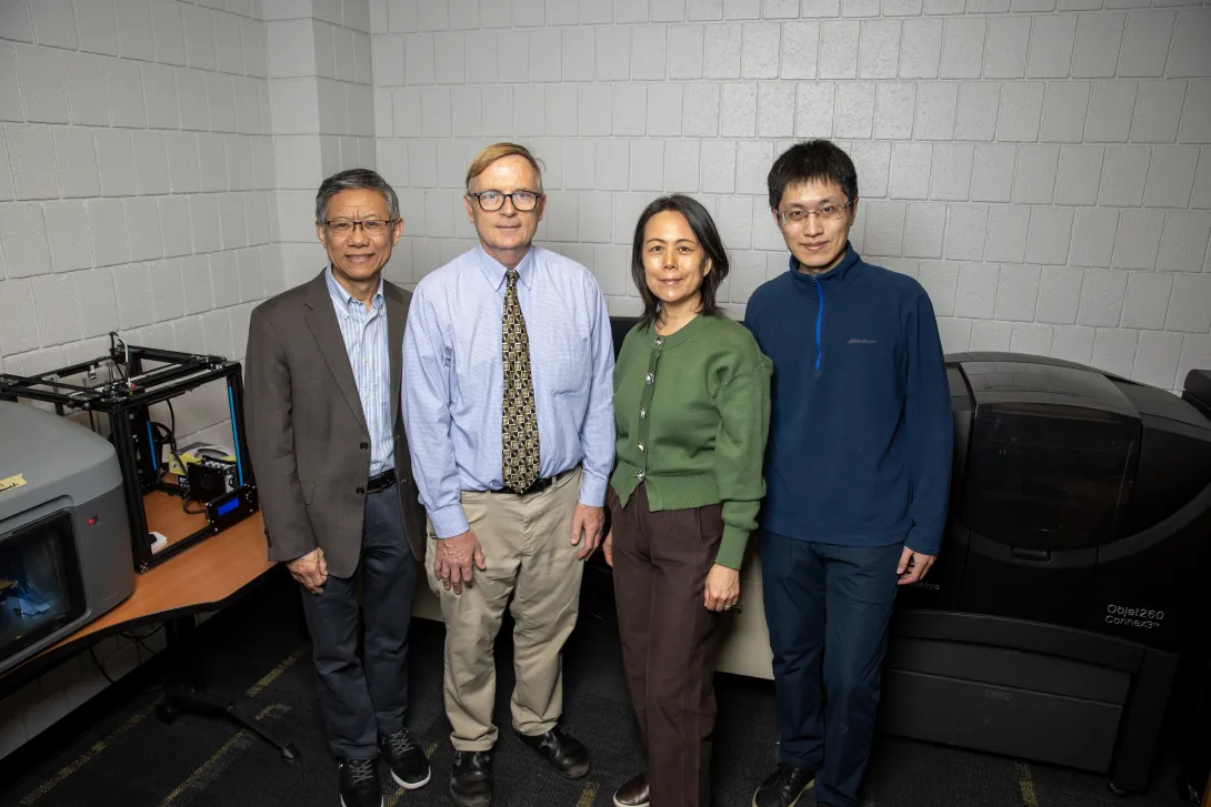 A photo of some of the researchers leading the project written about. 