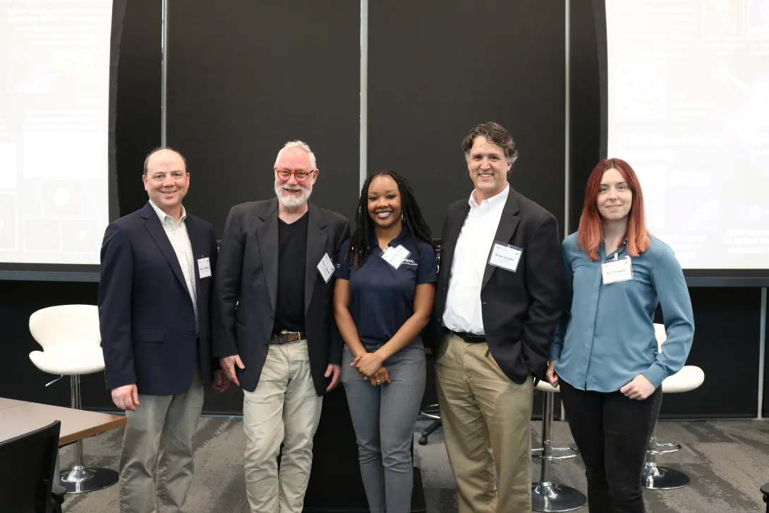 Group photo of five people, including Georgia Tech faculty